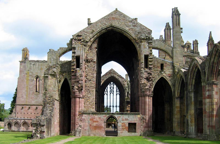 Cuthbert's Melrose Abbey was raided in 839 and then fell into ruin. It was refounded as a Cistercian abbey in 1136, three miles from its original site, because the land was better for farming there. It was destroyed and reconstructed several times, but alas, stands in ruin today. 